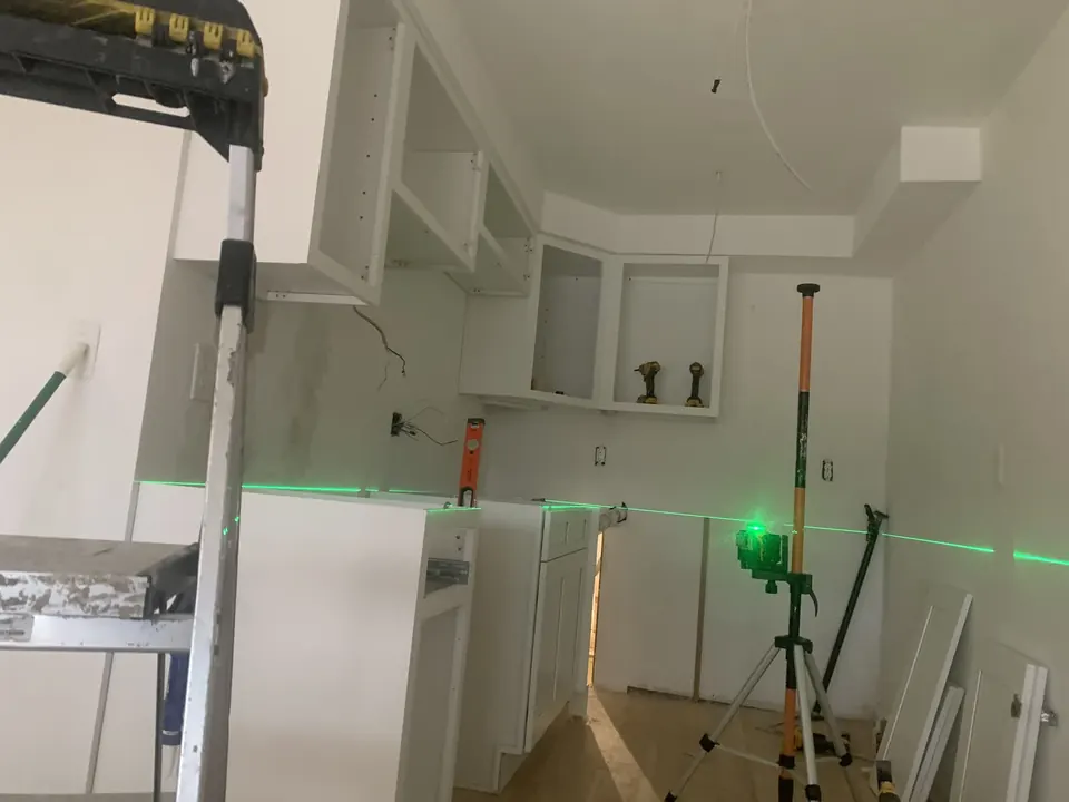 Apartment interior renovations: Kitchen and living spaces across several residential renovation projects.