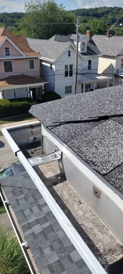 Roofing and exterior repairs: Roofing and exterior work, including visible shingle and trim repairs.