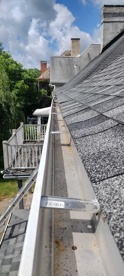 Roofing and exterior repairs: Roofing and exterior work, including visible shingle and trim repairs.
