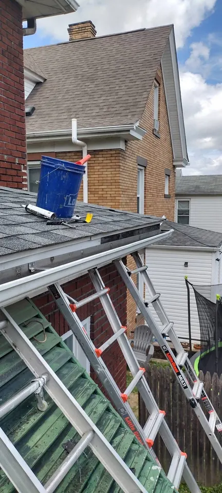 Roofing and exterior repairs: Roofing and exterior work, including visible shingle and trim repairs.