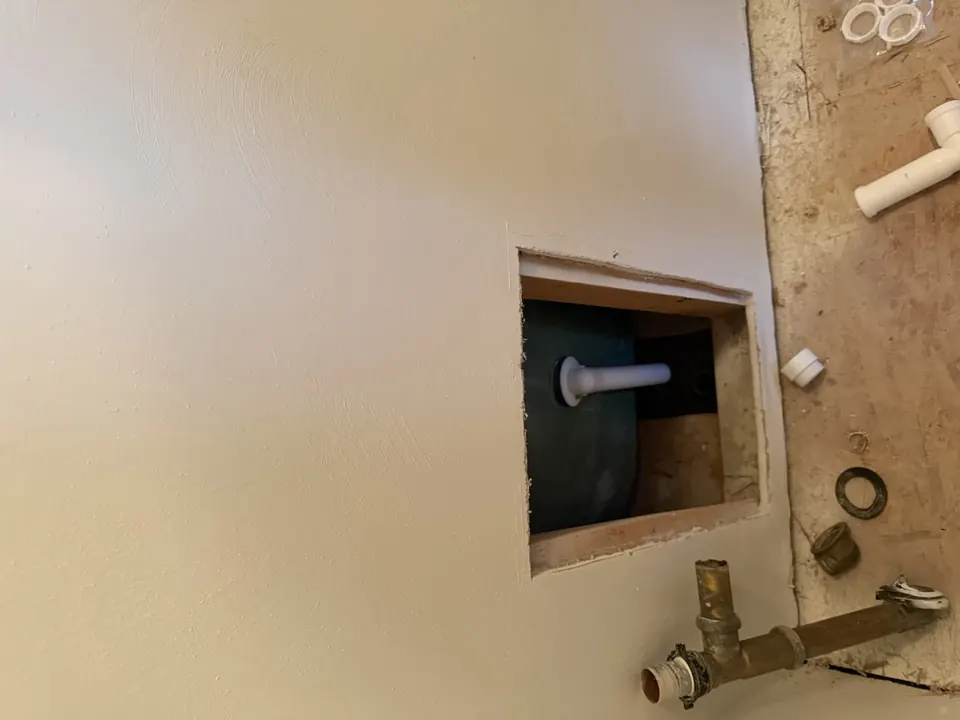 Bathroom and tile renovations: Bathroom renovation progress, tile installation, and finished fixtures.