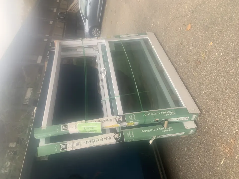 Window and exterior finish work: Window, deck-door, and exterior carpentry details.