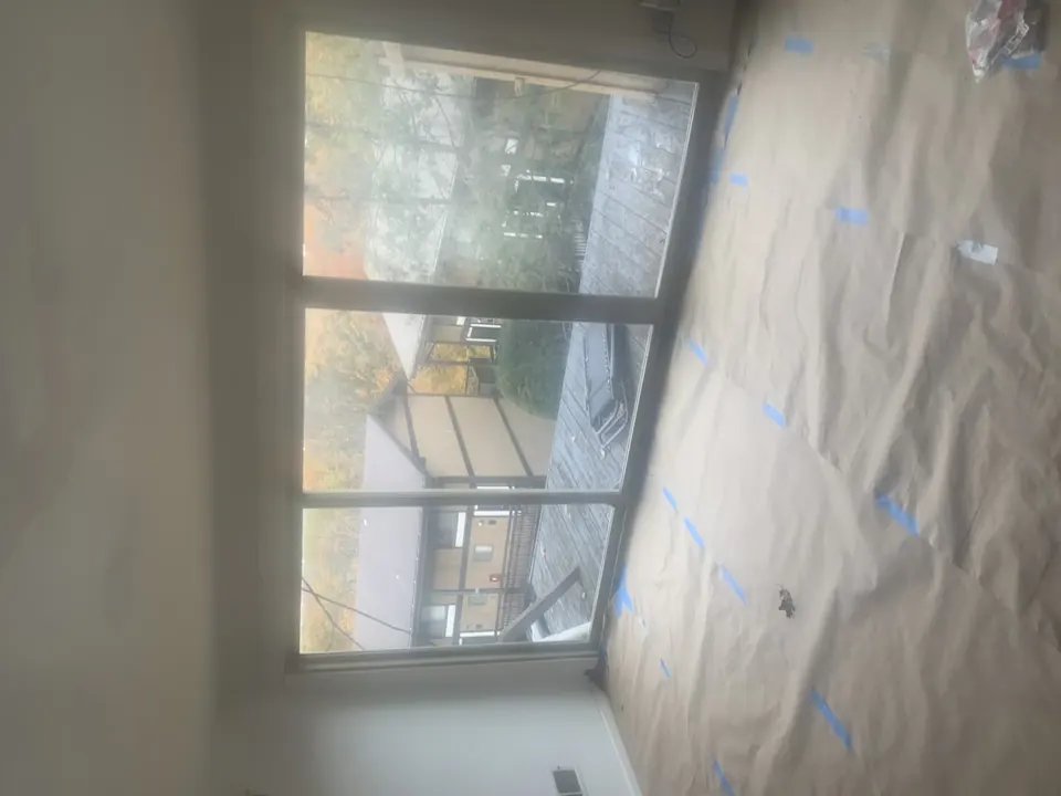 Window and exterior finish work: Window, deck-door, and exterior carpentry details.