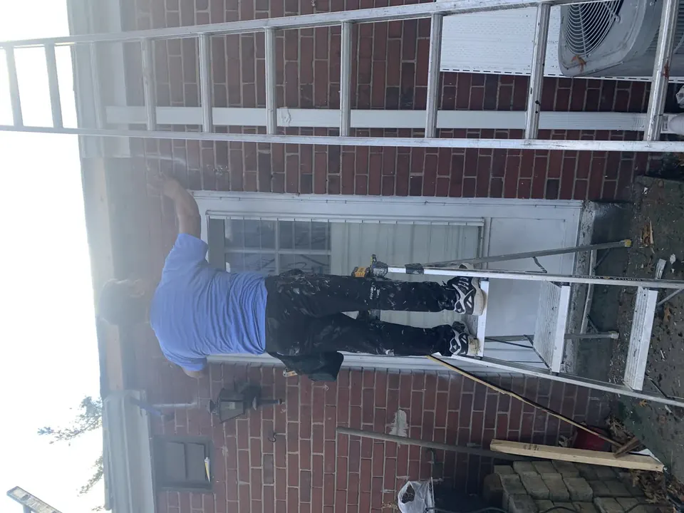 Window and exterior finish work: Window, deck-door, and exterior carpentry details.
