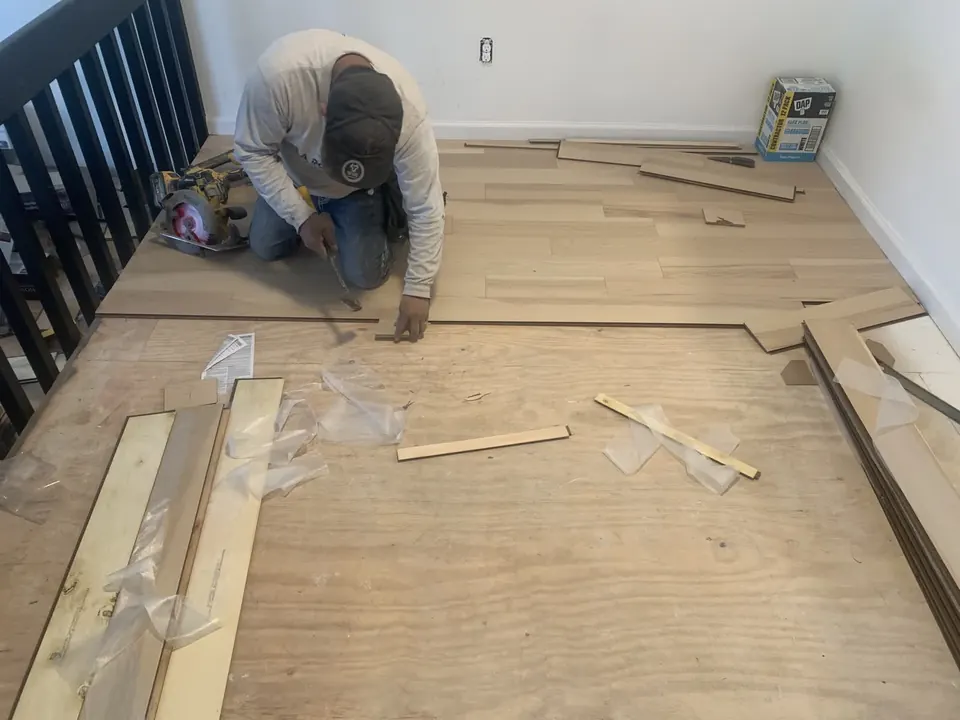 Flooring installation: Flooring preparation, installation, and finish work.