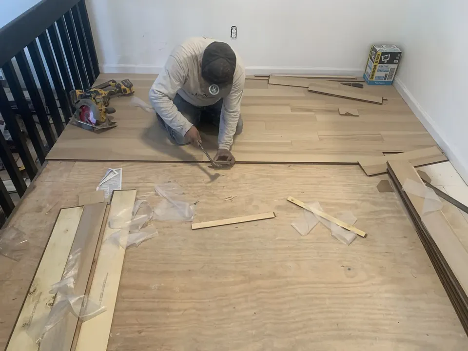 Flooring installation: Flooring preparation, installation, and finish work.