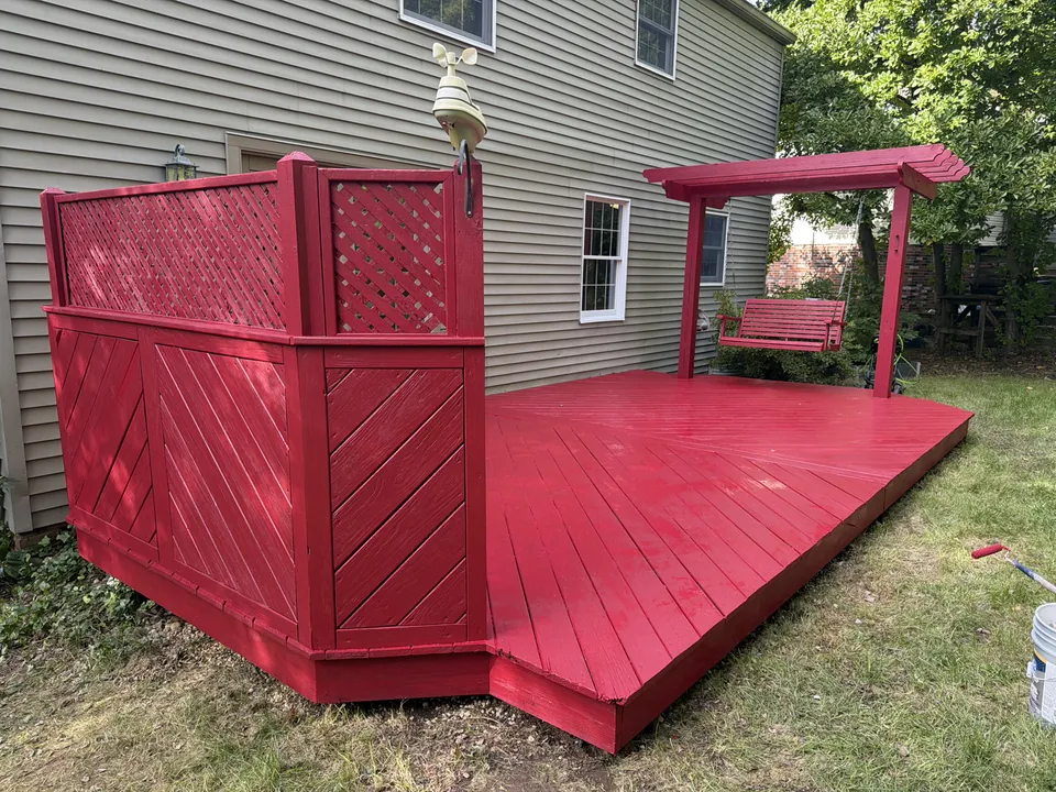 Refinished red deck, privacy screen, and swing