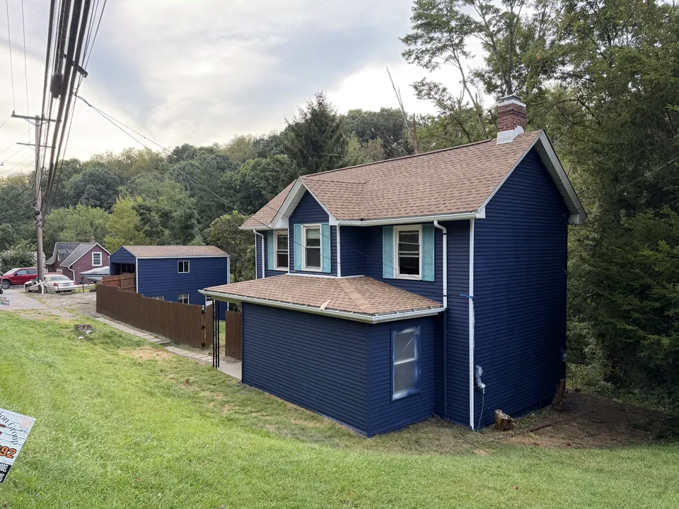 Finished blue house from the side