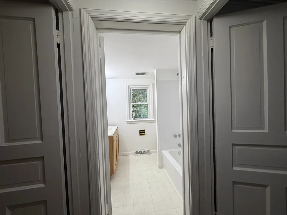 Painted hallway and bathroom entrance